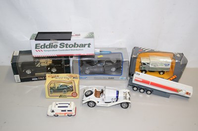 Lot 154 - A quantity of various boxed toy vehicles to...