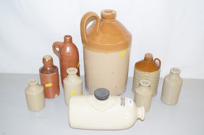 Lot 159 - An unbranded stone ware flagon together with a...