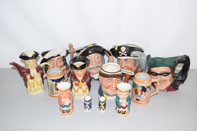 Lot 177 - A group of Royal Doulton character jugs to...