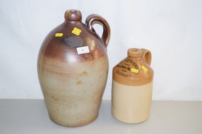 Lot 6 - Two stone ware flagons, one marked A Sheppard,...