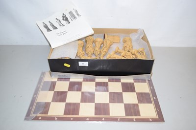 Lot 15 - Modern resin Camelot chess set and board