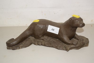 Lot 66 - A bronzed resin model of an otter