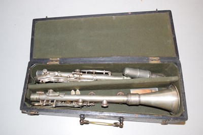 Lot 84 - A silver plated clarinet marked Laube