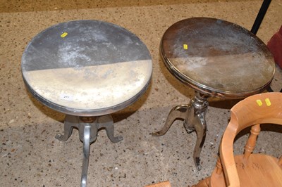 Lot 277 - A pair of modern metal wine tables
