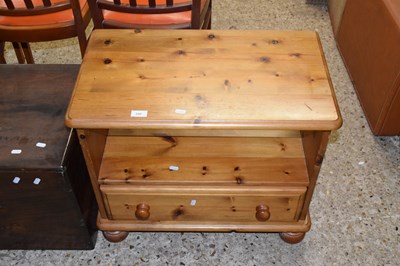 Lot 280 - A pine television cabinet