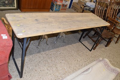 Lot 284 - A pine topped metal framed side table