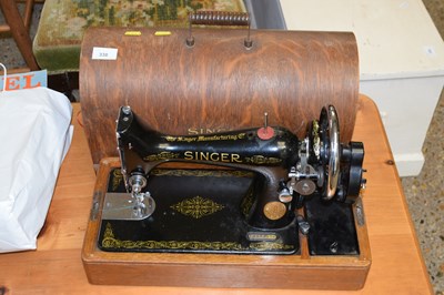 Lot 338 - A Singer sewing machine
