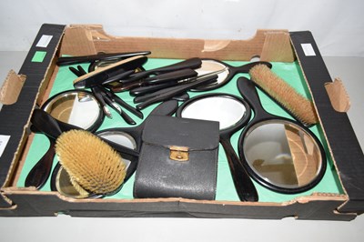 Lot 500 - A group of ebonised dressing table wares