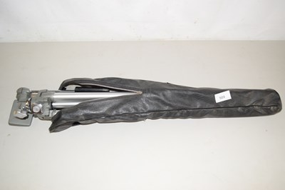Lot 509 - A cased camera tripod