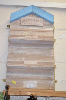 Lot 535 - A novelty Adnams wall shelf