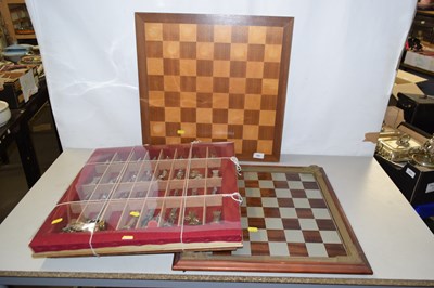 Lot 582 - A collection of various chess boards and chess...