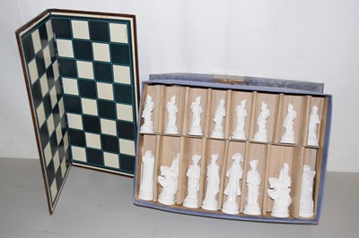 Lot 636 - Vintage chess board and plaster chess pieces