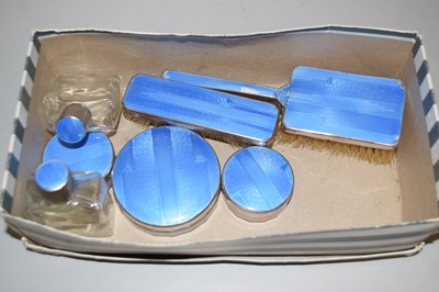 Lot 121 - An enamel back dressing table brush and bottle...
