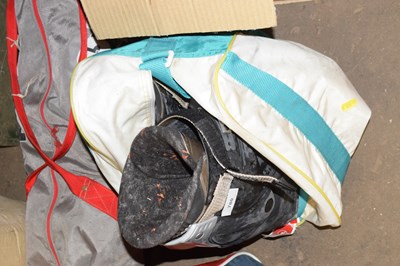 Lot 780 - A bag containing a pair of ski boots