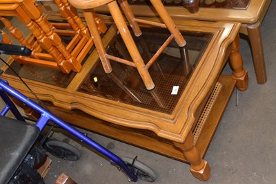 Lot 785 - A vintage glass topped coffee table