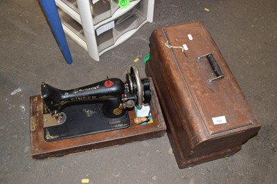 Lot 824 - A cased sewing machine