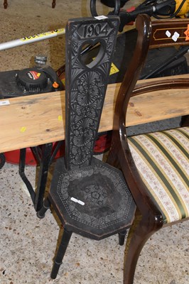 Lot 358 - An early 20th Century carved high back weavers...