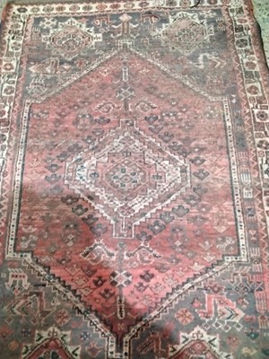 Lot 370 - A Middle Easter floor rug decorated with a...