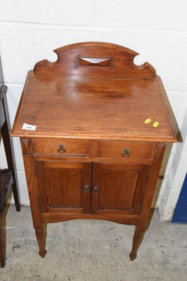 Lot 382 - A late 19th Century two door two drawer...