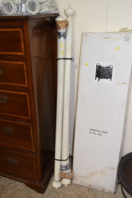 Lot 394 - A group of cream painted curtain poles with...