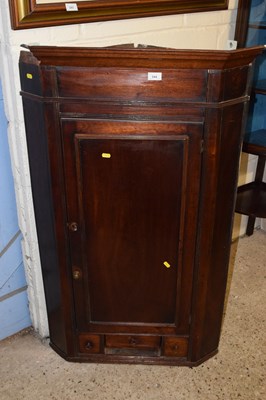 Lot 244 - A Georgian oak corner cabinet
