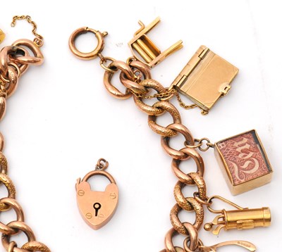 Lot 84 - A 9ct charm bracelet, the curblink bracelet...