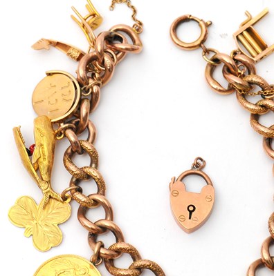 Lot 84 - A 9ct charm bracelet, the curblink bracelet...