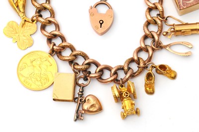 Lot 84 - A 9ct charm bracelet, the curblink bracelet...