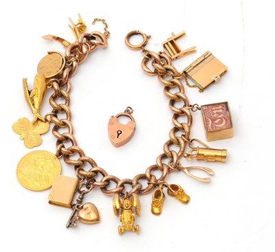 Lot 84 - A 9ct charm bracelet, the curblink bracelet...