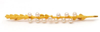 Lot 46 - A 15ct seed pearl brooch, the brooch modelled...