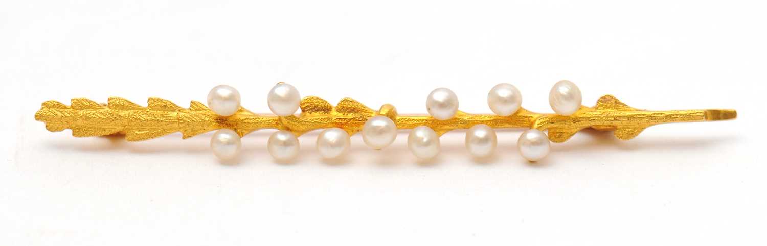 Lot 46 - A 15ct seed pearl brooch, the brooch modelled...