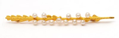Lot 46 - A 15ct seed pearl brooch, the brooch modelled...