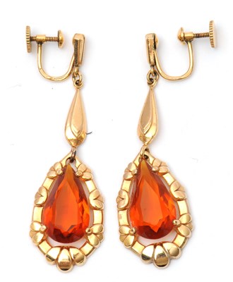 Lot 60 - A pair of citrine earrings, with pear shape...