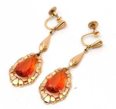 Lot 60 - A pair of citrine earrings, with pear shape...