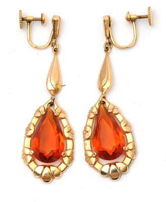 Lot 60 - A pair of citrine earrings, with pear shape...