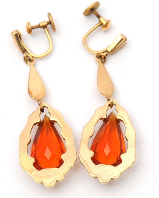 Lot 60 - A pair of citrine earrings, with pear shape...