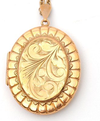 Lot 97 - A 9ct locket and chain, the oval locket with...