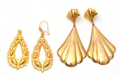Lot 103 - Two pairs of repousse earrings, both with...