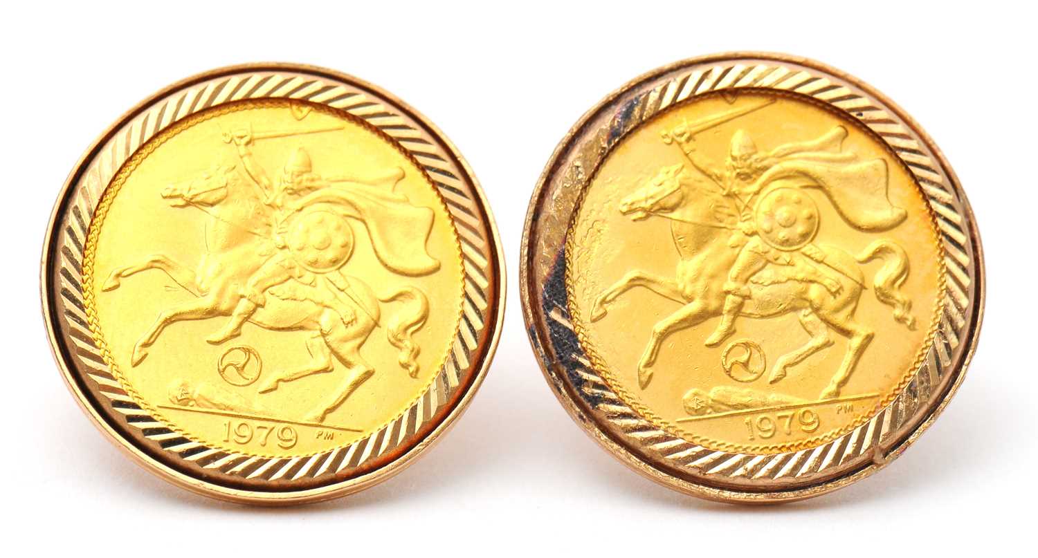 Lot 87 - A pair of 9ct mounted Isle of Man half...