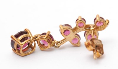 Lot 81 - A pair of 9ct garnet earrings, set with round...