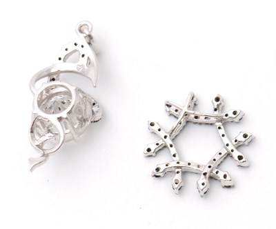 Lot 78 - Two 9ct pendants: to include a white stone and...
