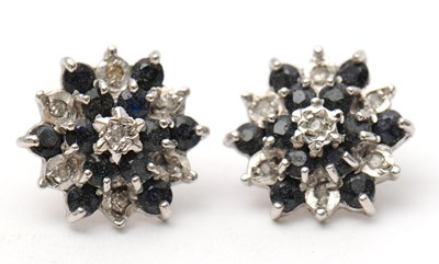 Lot 56 - A pair of 9ct sapphire and diamond earstuds,...
