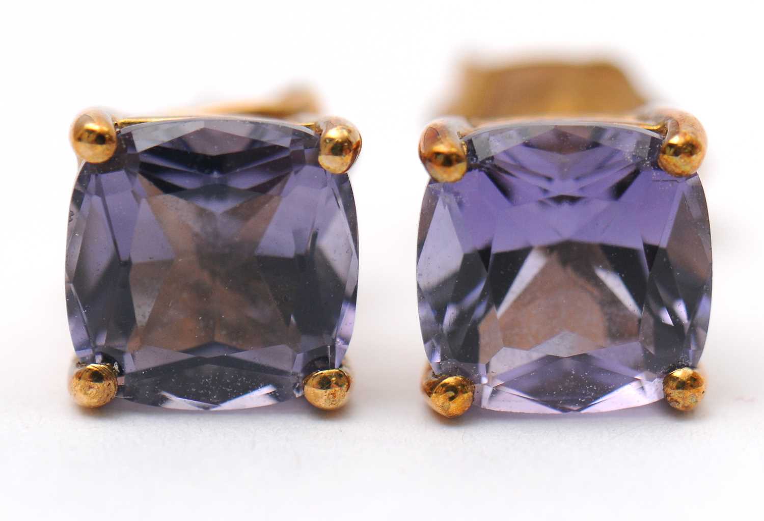 Lot 64 - A pair of 9ct iolite earstuds, 6.5 x 6.5mm,...