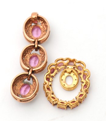 Lot 65 - Two gemset pendants: to include a 9ct three...