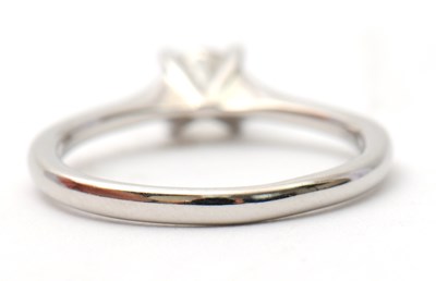 Lot 21 - A platinum diamond ring, with round brilliant...