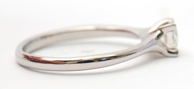 Lot 21 - A platinum diamond ring, with round brilliant...