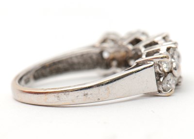 Lot 20 - An 18ct diamond ring, set with round brilliant...