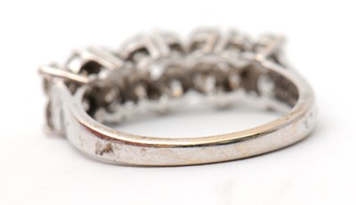Lot 20 - An 18ct diamond ring, set with round brilliant...