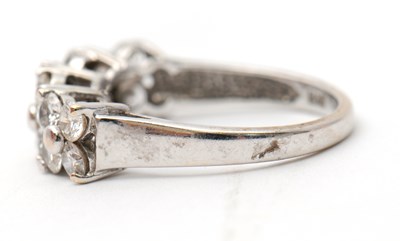 Lot 20 - An 18ct diamond ring, set with round brilliant...