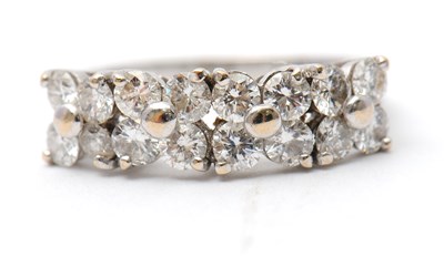 Lot 20 - An 18ct diamond ring, set with round brilliant...